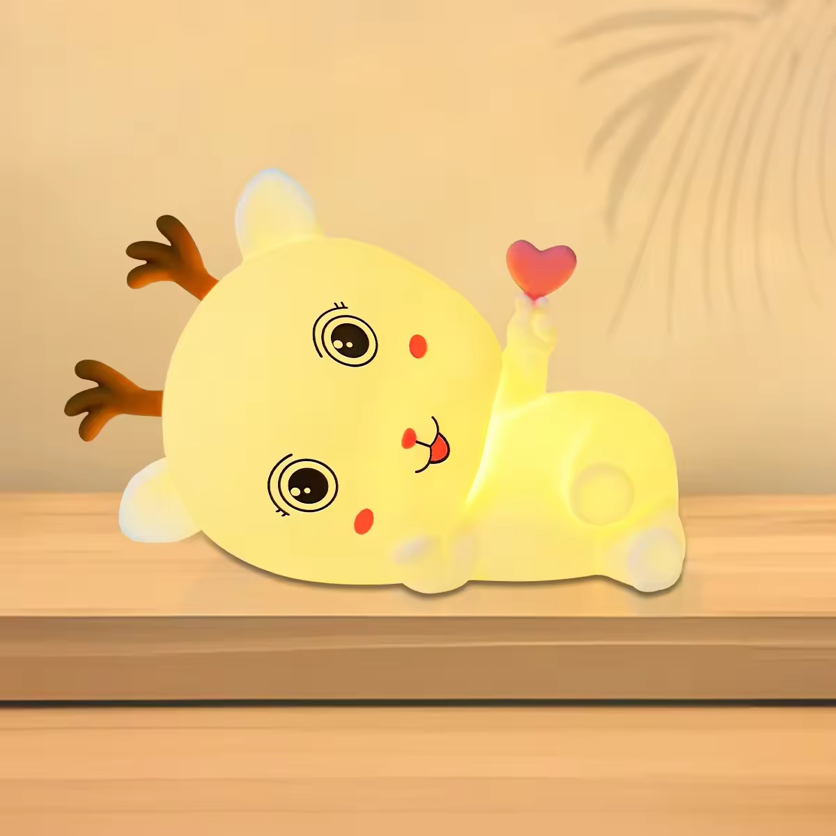 Pink deer table lamp: squishy silicone, soft glow. Tap to light—adorable silhouette casts warm, dreamy vibes. Cute decor blending coziness and charm.